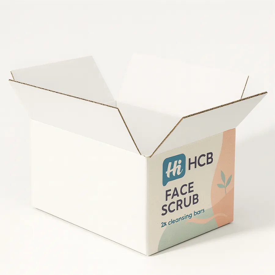 An open white corrugated shipping carton featuring printed face scrub branding on the front panel- class=